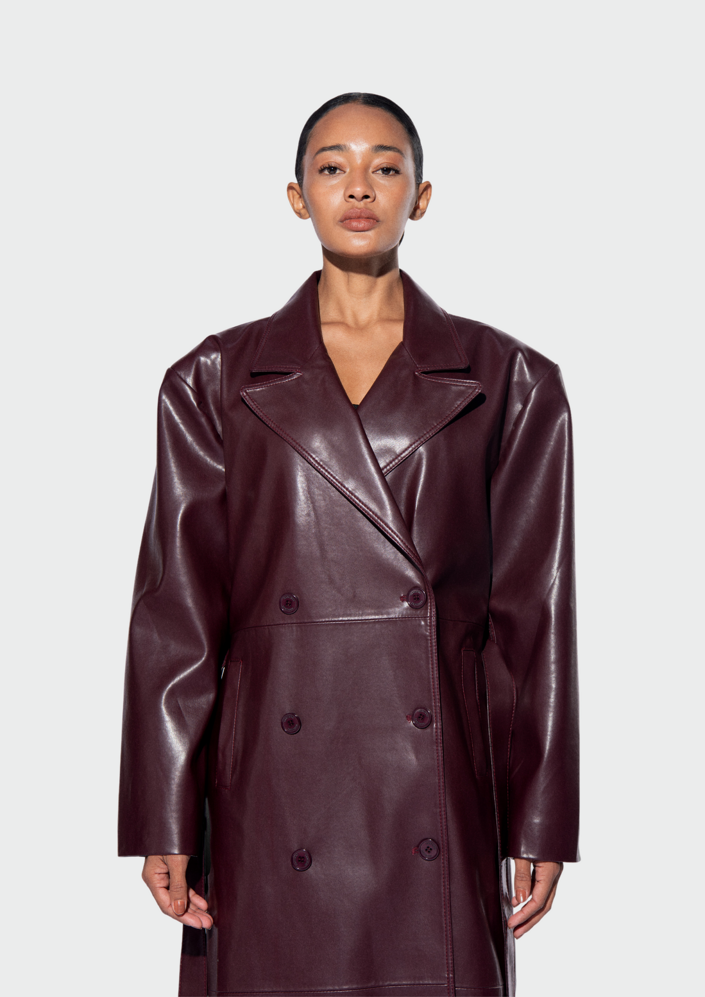 HARLIENZ RAVEN LEATHER COAT